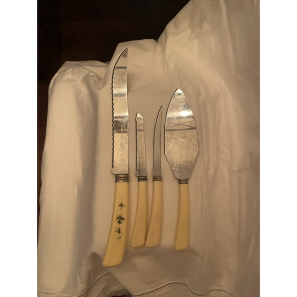 Fleur-de-lis Other - VINTAGE 4-PC FLEUR-DE-LIS STAINLESS STEEL FLATWARE LOT BAKELITE HANDLES